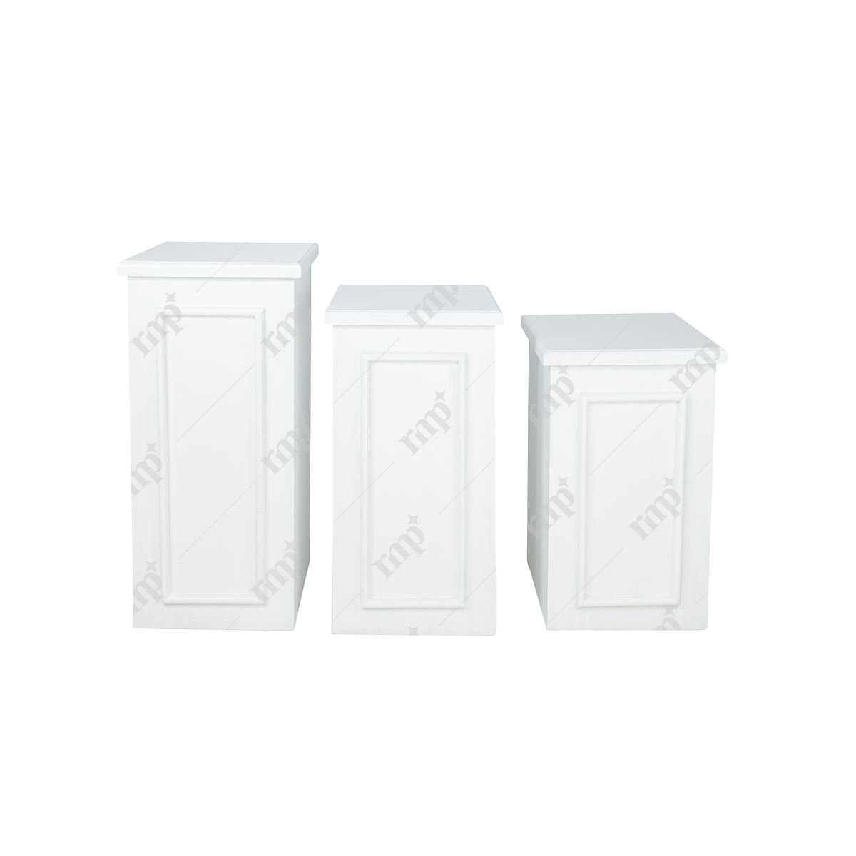 Three white storage boxes with decorative patterns on a white background