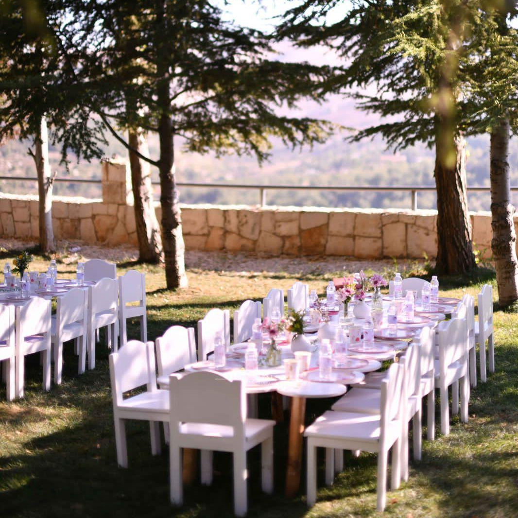 Kids birthdays setup with tables and chairs 